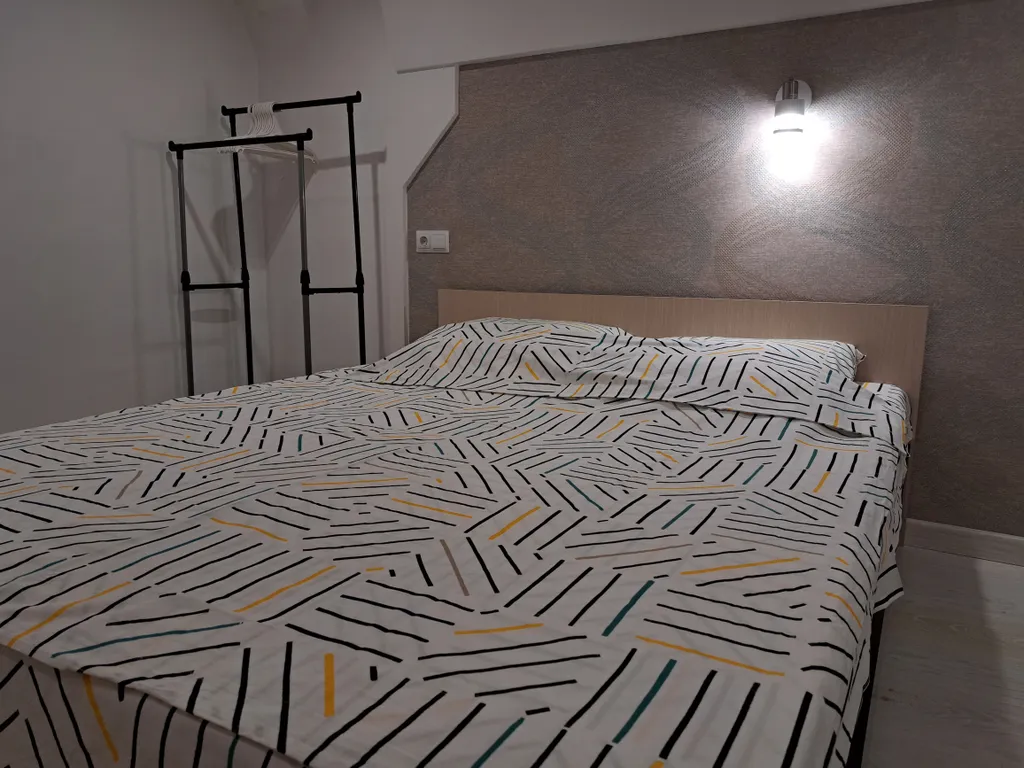 Стильная и уютная двухъярусная студия