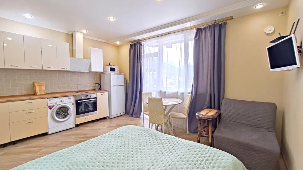 Потрясающий вид с балкона на горы! Идеальная студия в центре для вас