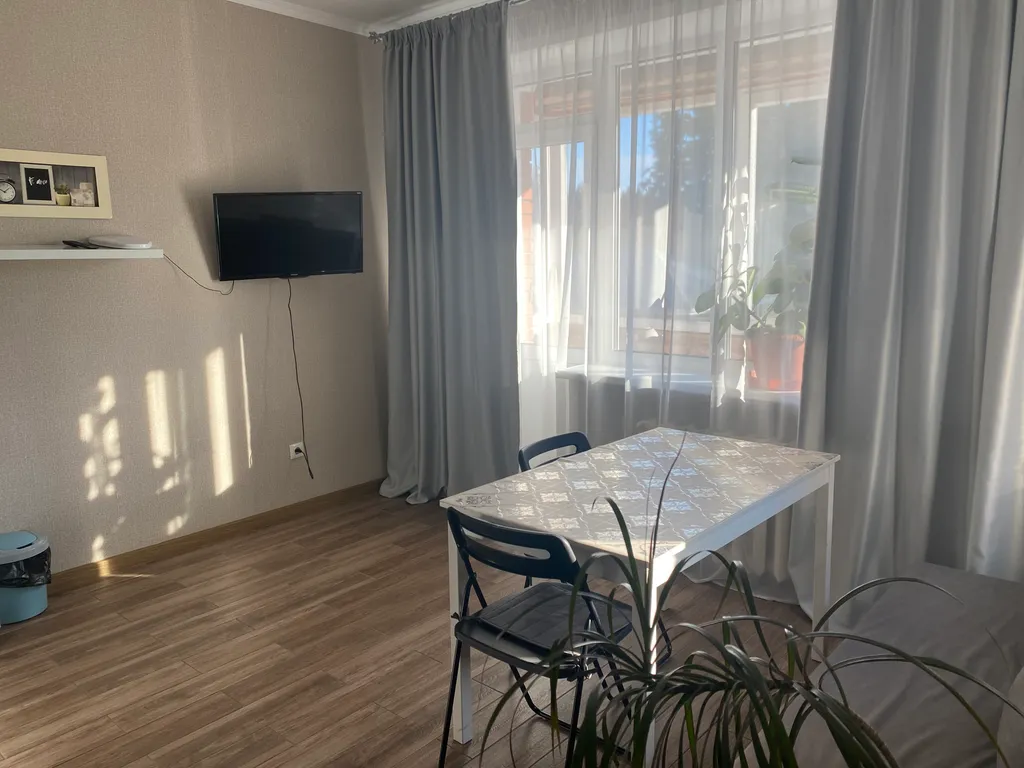 Квартира с балконом с видом на лес