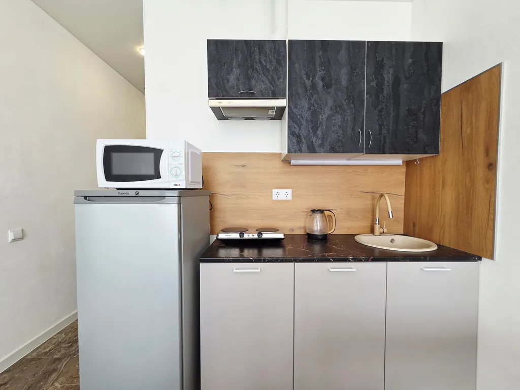 Уютная студия с видом на город