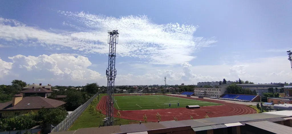 Уютная студия с видом на городской стадион Авангард