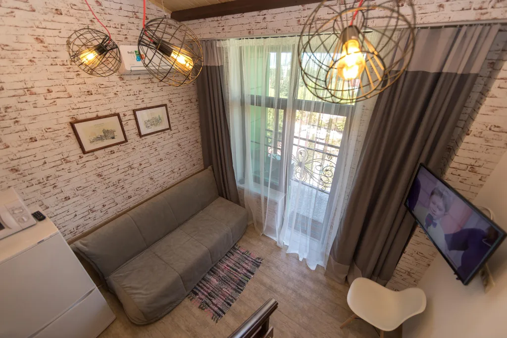 Двухуровневая стильная квартира у моря