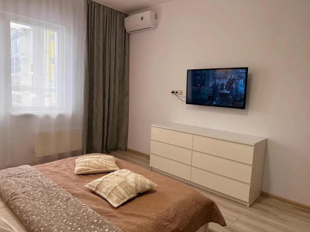 Уютная квартира с роскошной кроватью