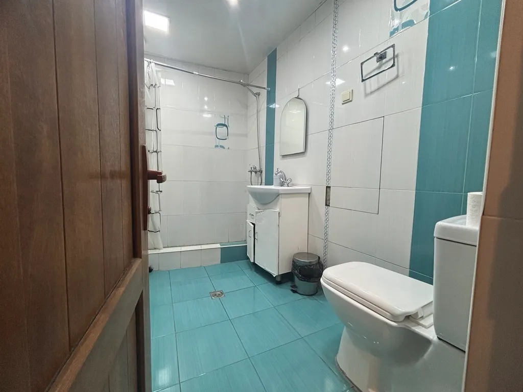 Уютный гостевой дом с частными комнатами и общим санузлом