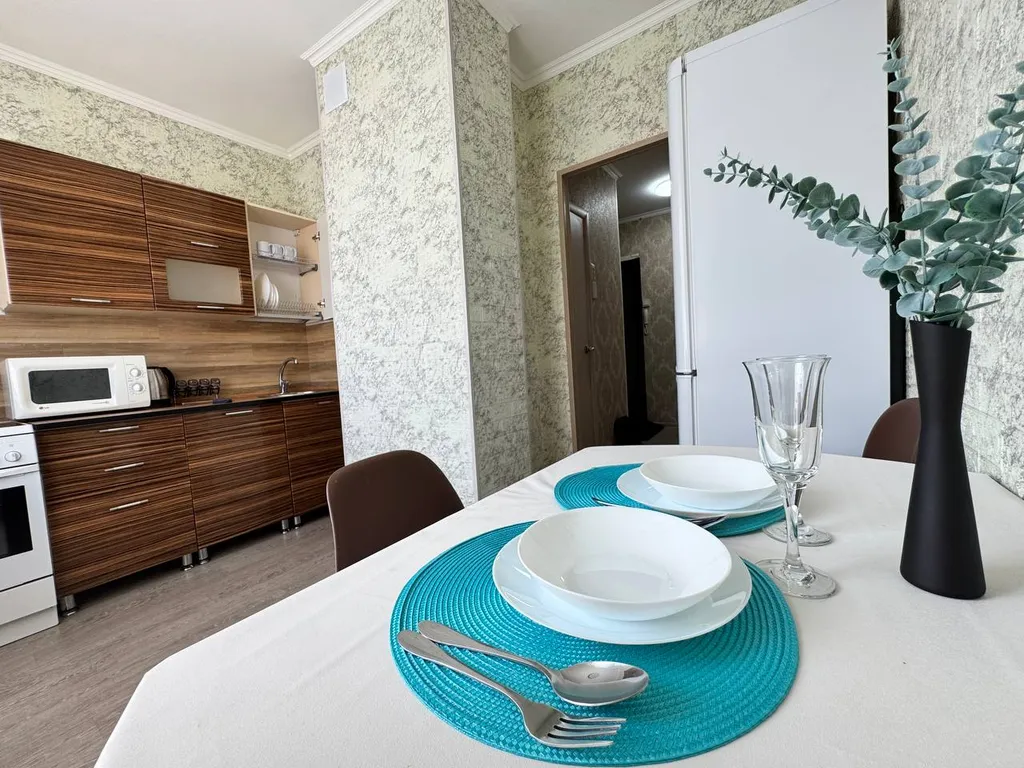 Апартаменты с балконом и рабочим местом в центре. Бесконтактный заезд