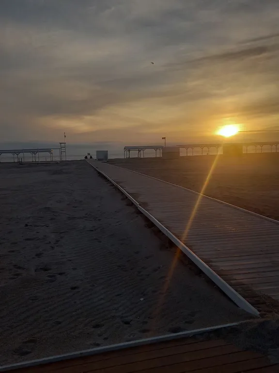 Часть дома с зеленым двориком на Косе у моря