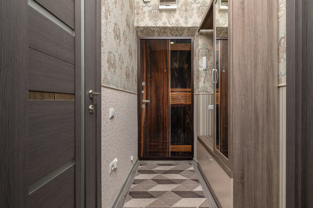 Уютная квартира с большой панорамной лоджией и видом на стадион