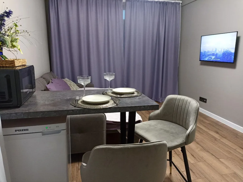 Сиреневая квартира с панорамой на город