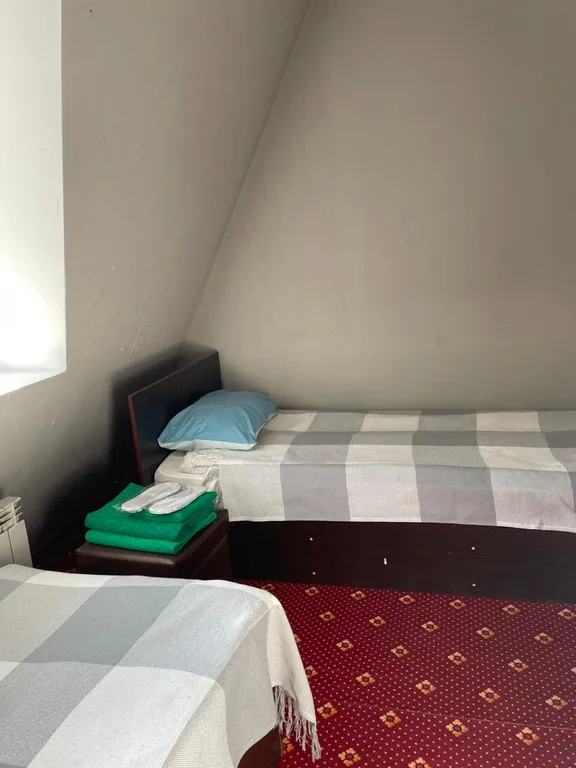 Номер с 2 отдельными кроватями в сердце Домбая