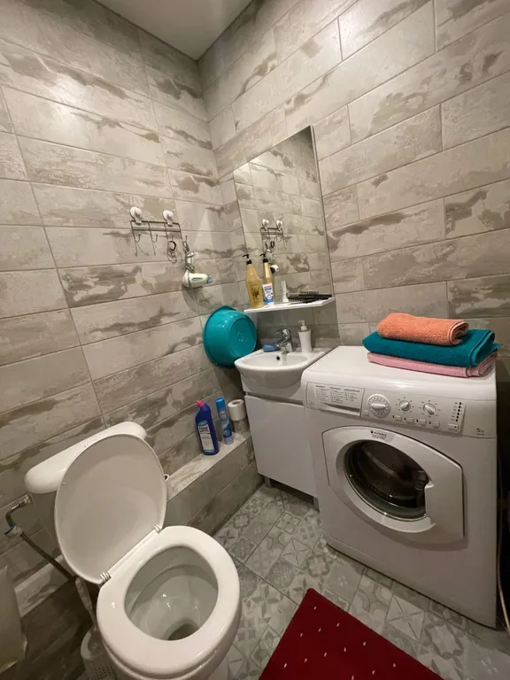 Уютная квартира студия в новом доме в центре города