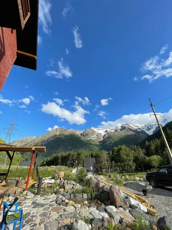 Уютная студия люкс с панорамными окнами с видом на горы