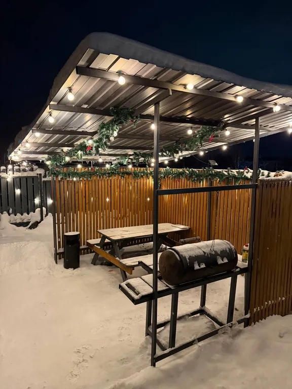 Коттедж с сауной для семейного отдыха в стиле барнхаус