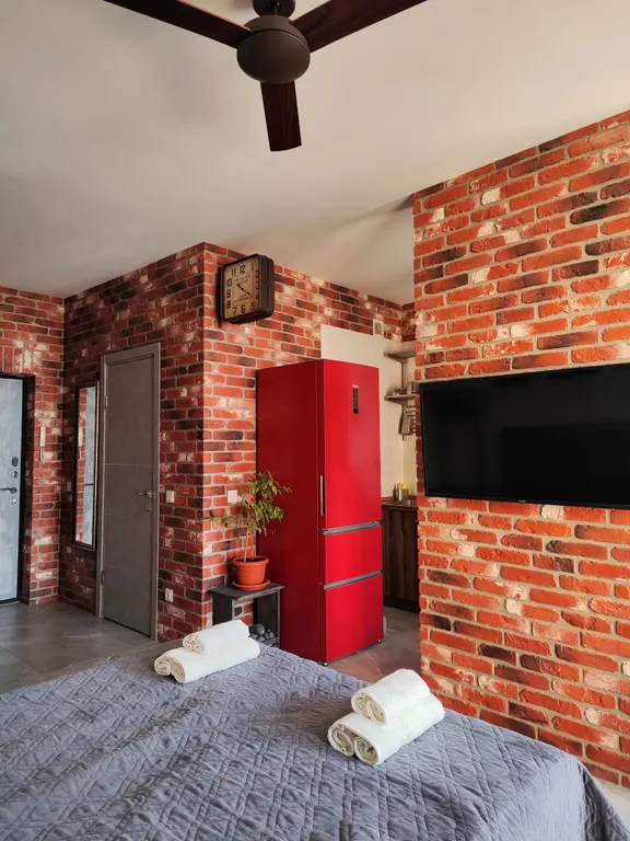 Уютная квартира-студия в стиле лофт в тихом районе