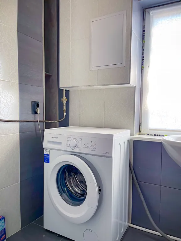 Двухкомнатная квартира с двориком и парковкой