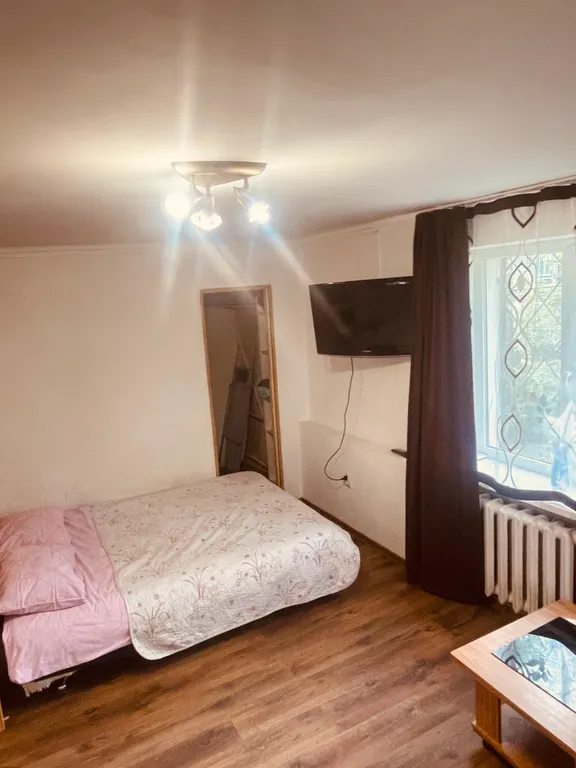 Квартира с виноградными гроздьями в центре