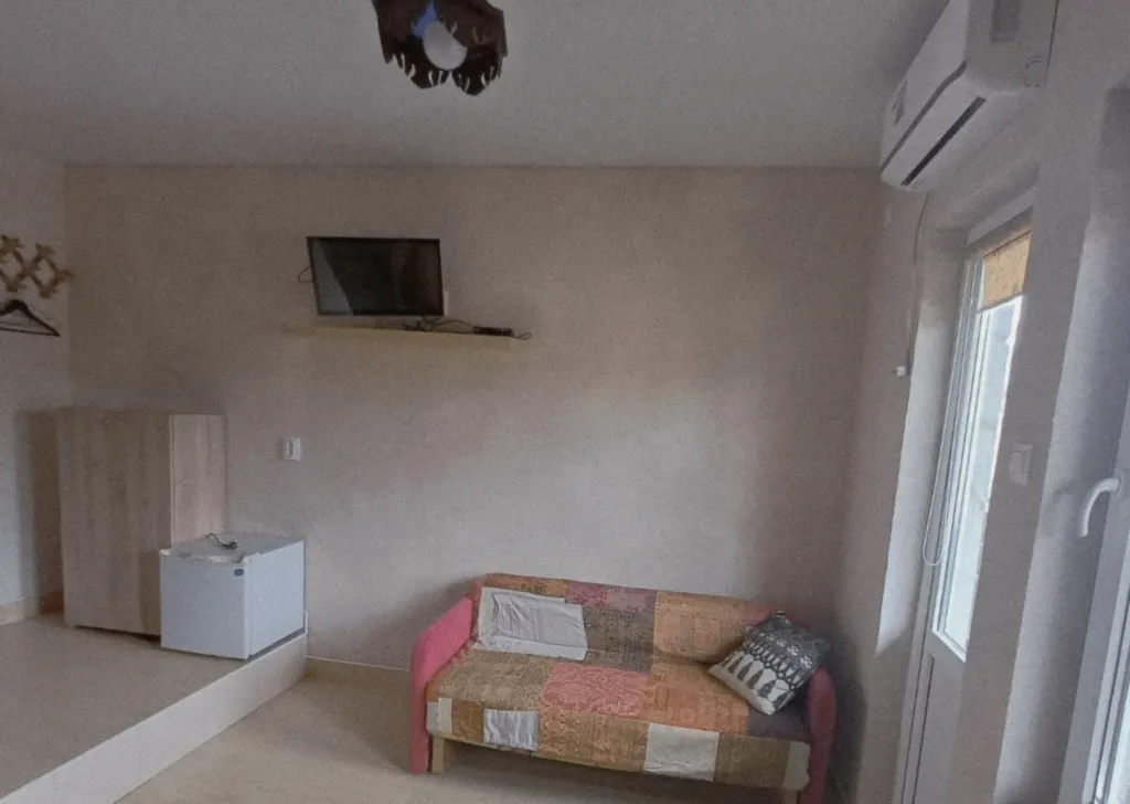 Трехместная уютная комната с балконом и видом на вулкан