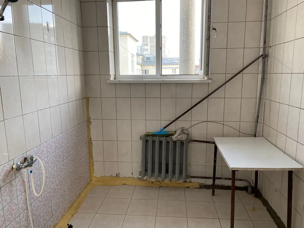 Комната в общежитии коридорного типа