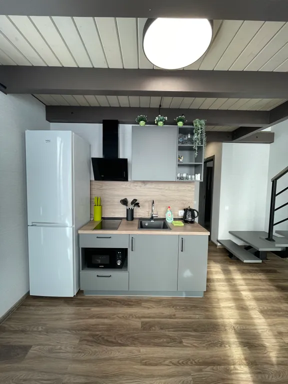 Уютная двухуровневая квартира с видом на горы