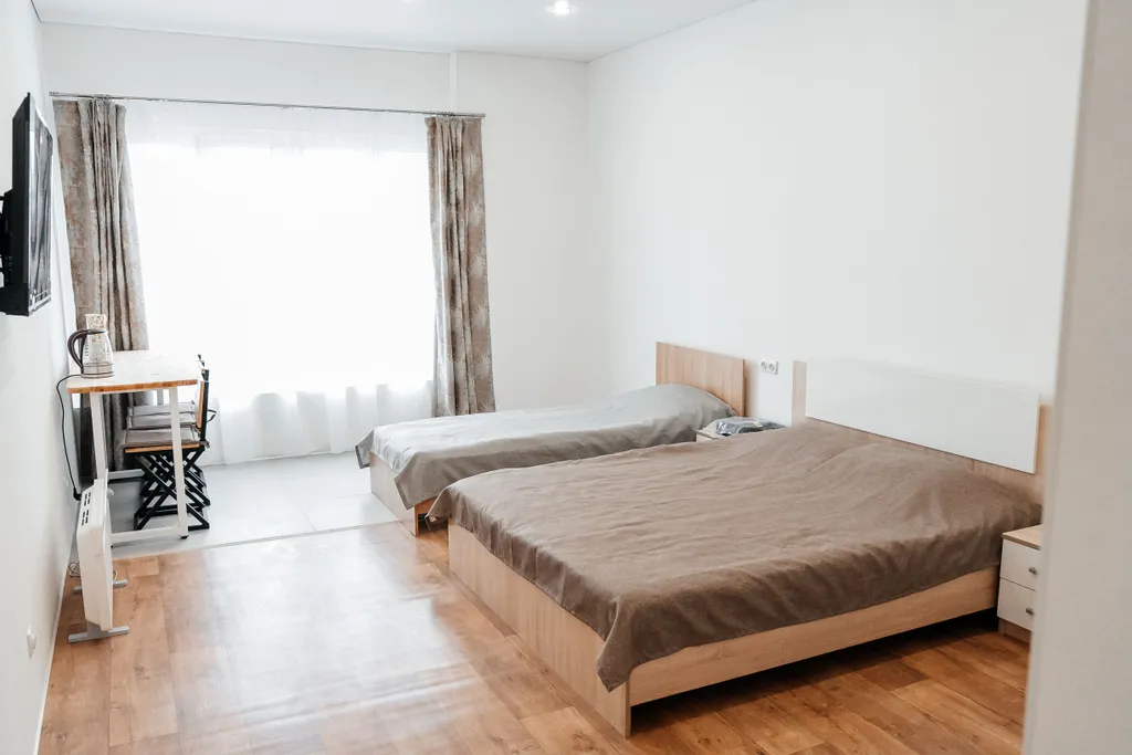 Современный трехместный номер в доме с видом на океан и вулканы