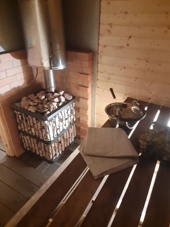 Коттедж Домик с сауной и купелью у леса — Деревянное