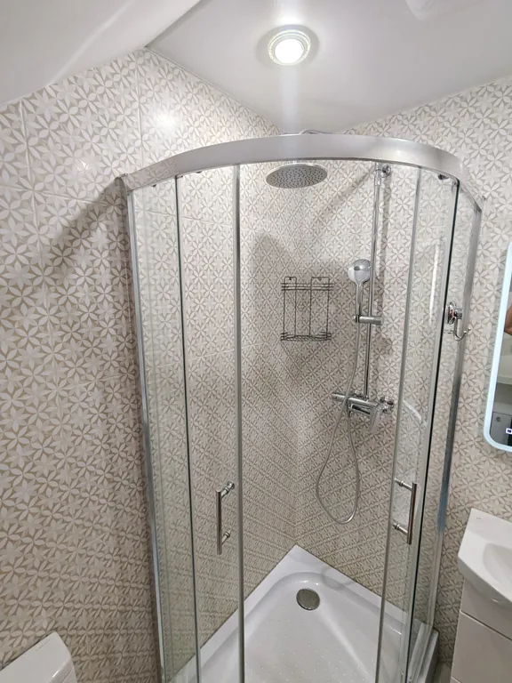 Четырехместный семейный номер с четырьмя кроватями в мансарде