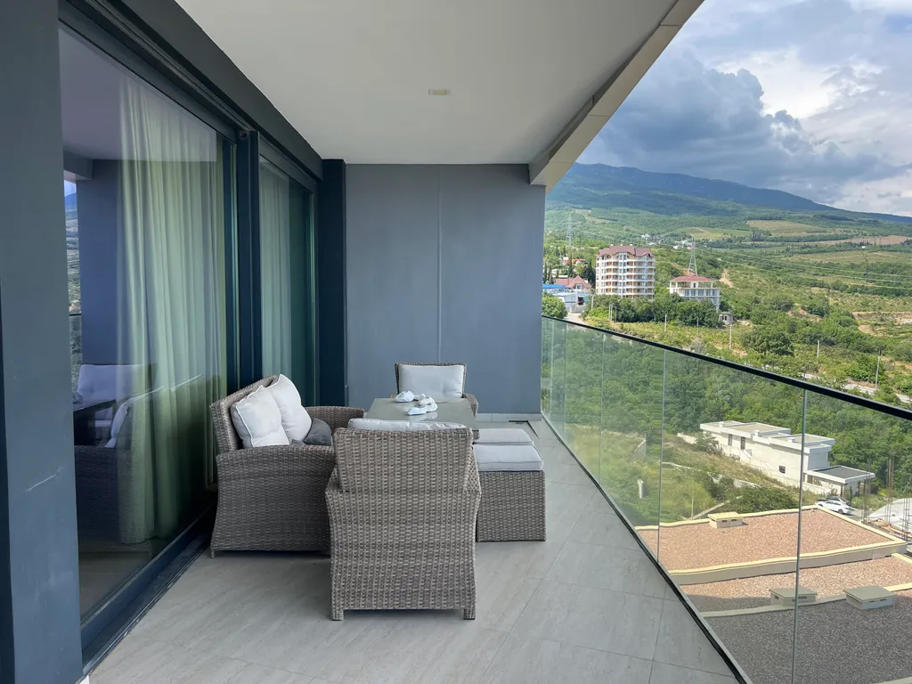 Однокомнатная комнатная с видом на море