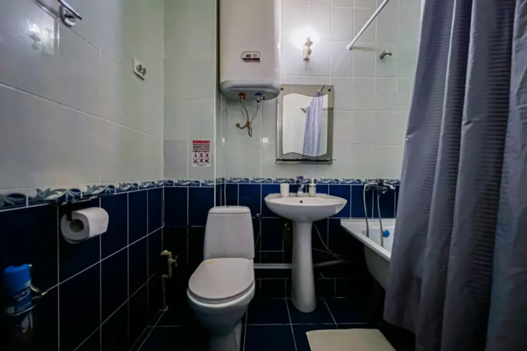 Трехместный номер с балконом