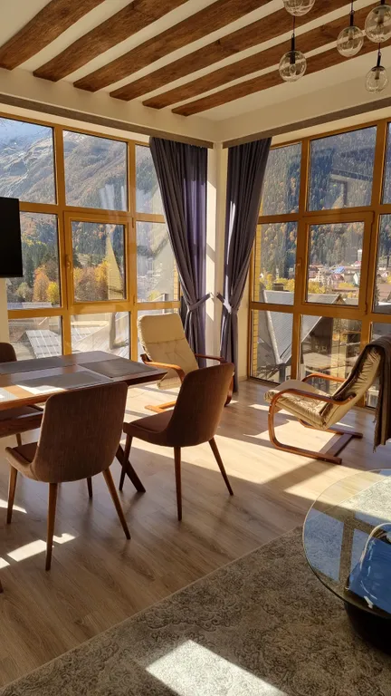 Апартаменты с восхитительными панорамными видами на вершины Домбая