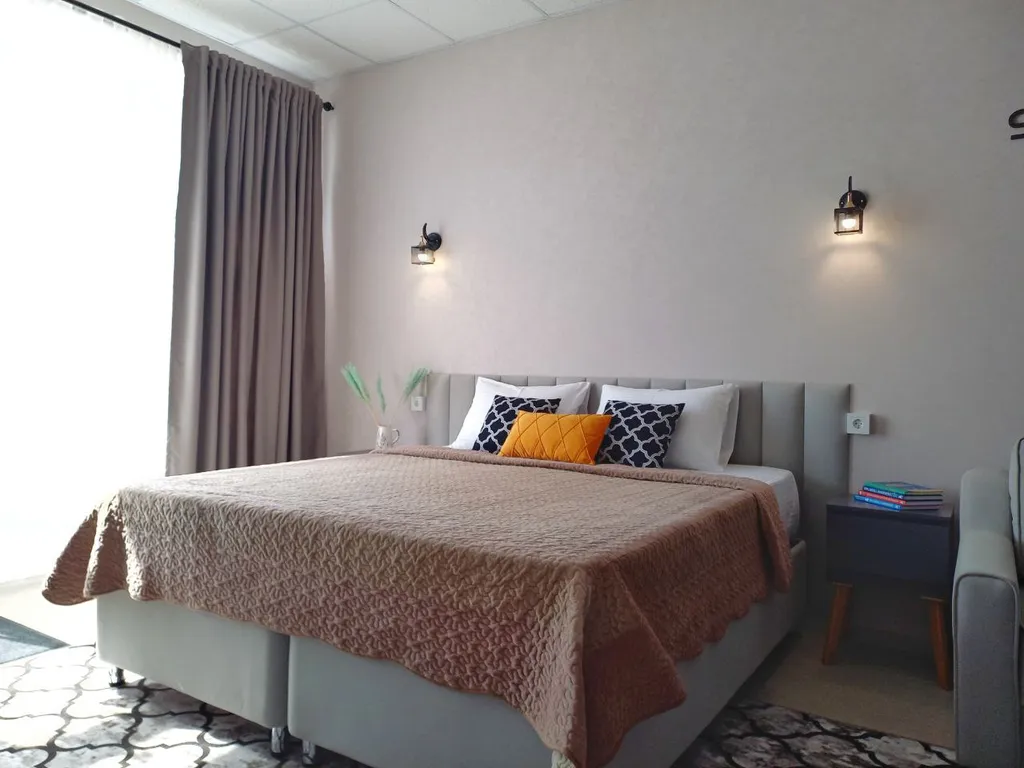 Комфортный семейный номер-студия с видом на горы