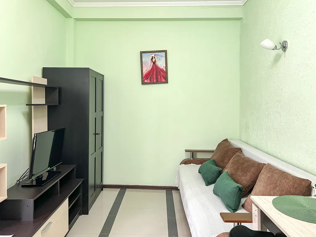 Семейный номер с кухней в центре