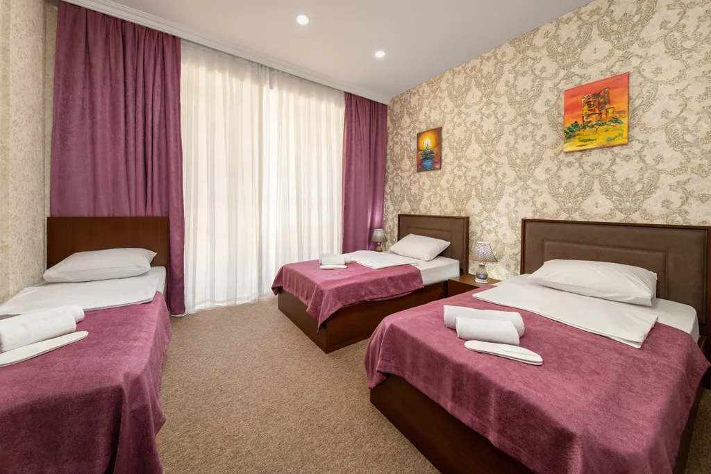 Улучшенный трехместный номер