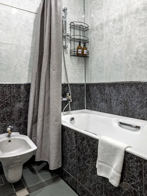 Четырехкомнатная квартира в элитном доме на Тверской