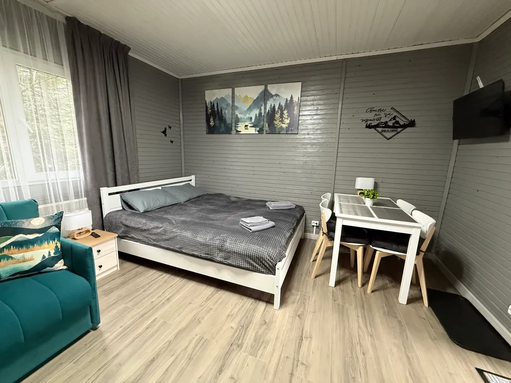 Квартира Уютная комната для четверых в деревянном таунхаусе у озера — Мезмай