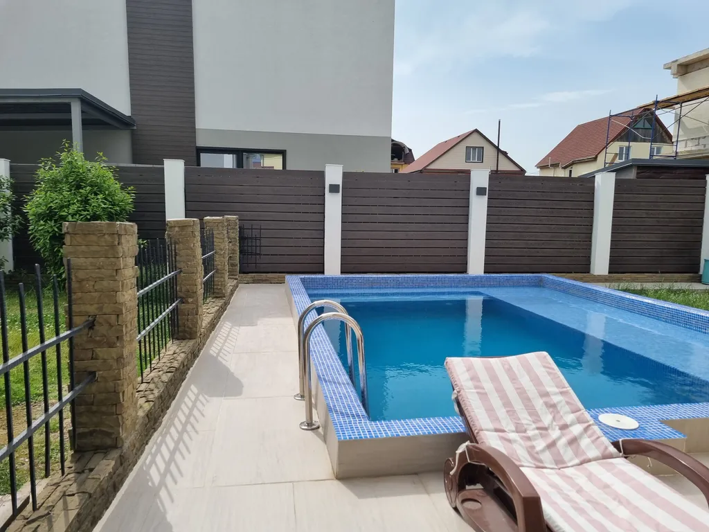 Коттедж Коттедж Аппартаменты с бассейном — Сириус