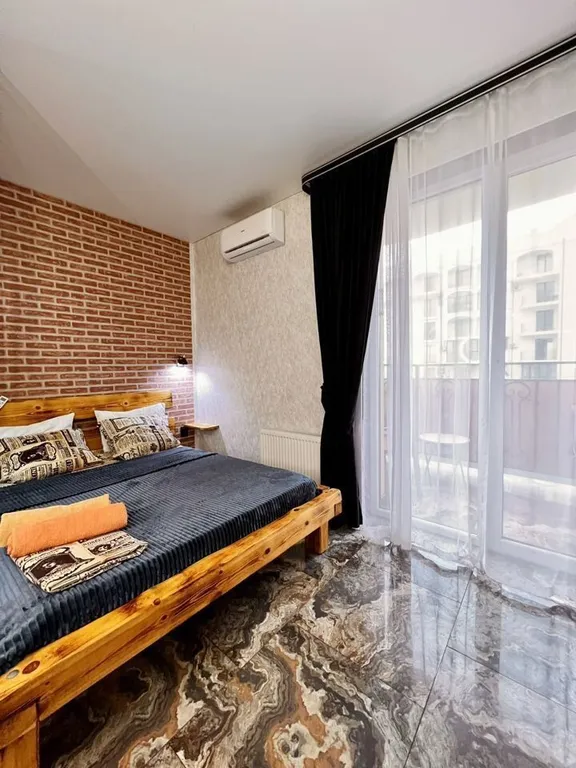 Студия с дизайнерским ремонтом