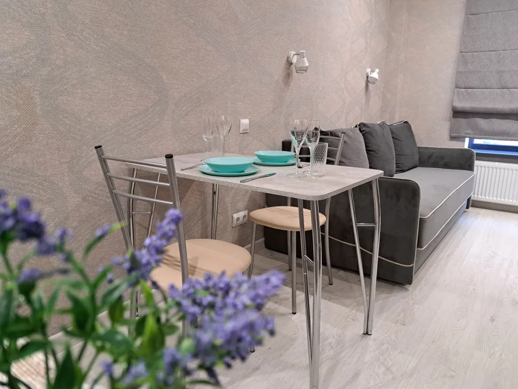 Стильная и уютная двухъярусная студия