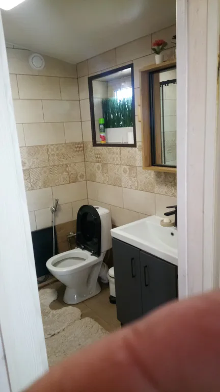 Уютный коттедж с баней и подогреваемой купелью.