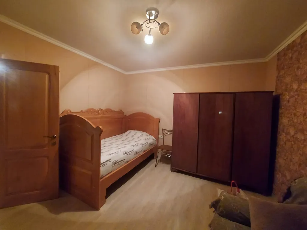 Дом в центре города на набережной реки Терек