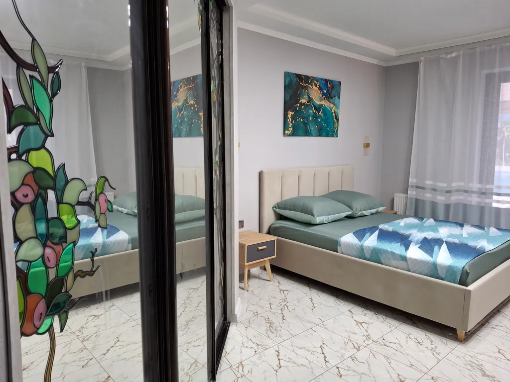 Большой четырёхместный люкс с выходом на бассейн 16