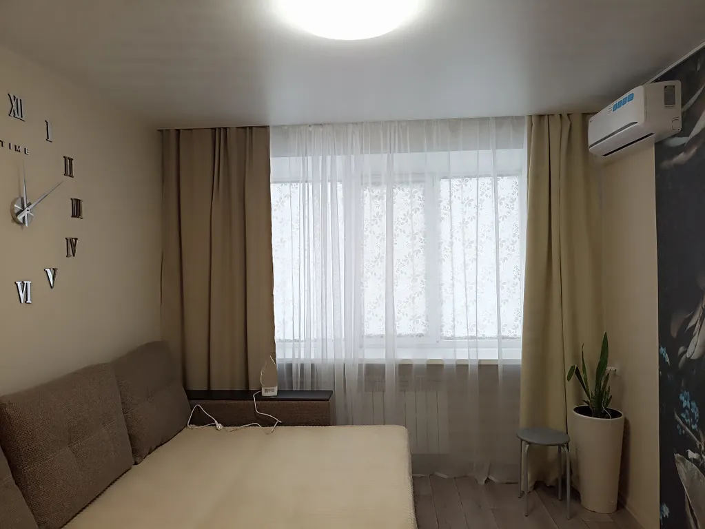 1-комнатная квартира в центре города с асфальтированной парковкой