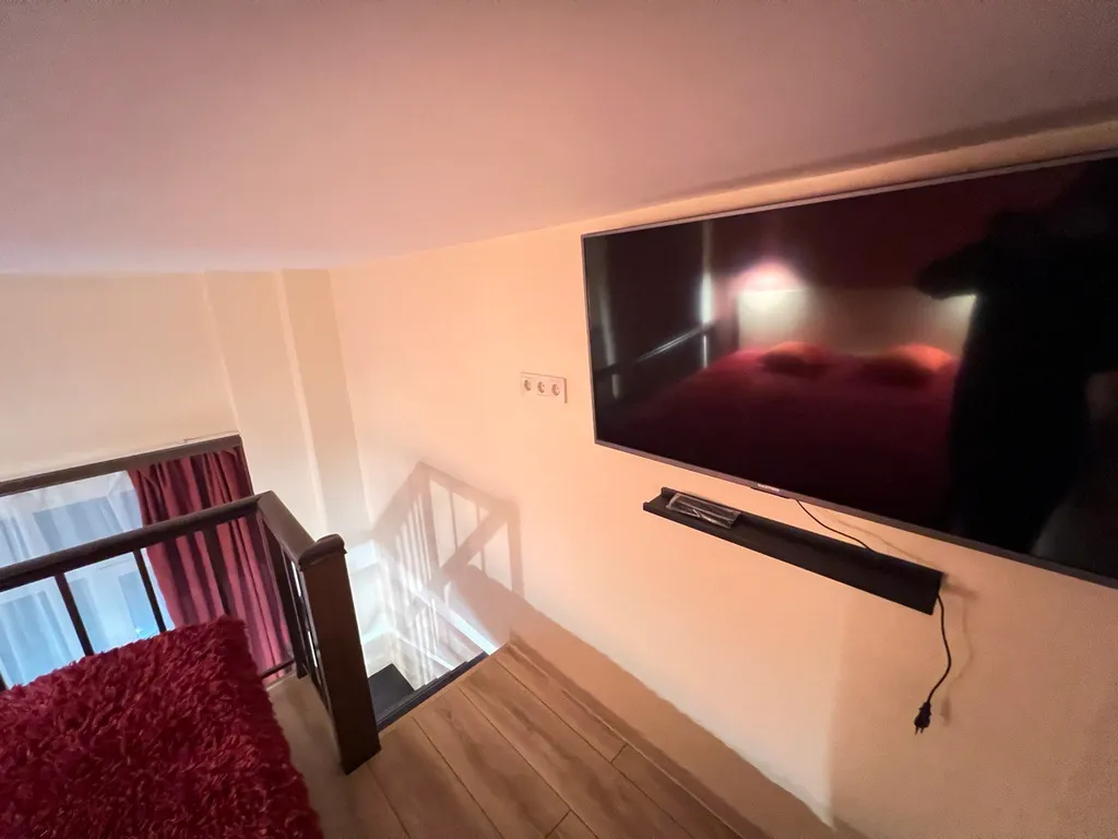 Стильная двухуровневая студия Лофт