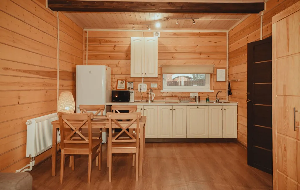 Двухкомнатный дом с верандой и панорамными окнами