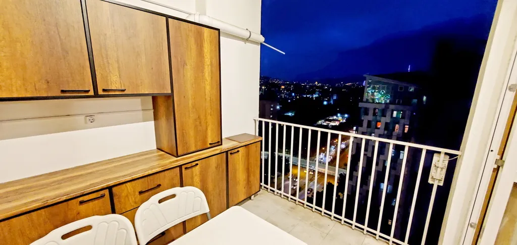 Уютная квартира с большим балконом и видом на город