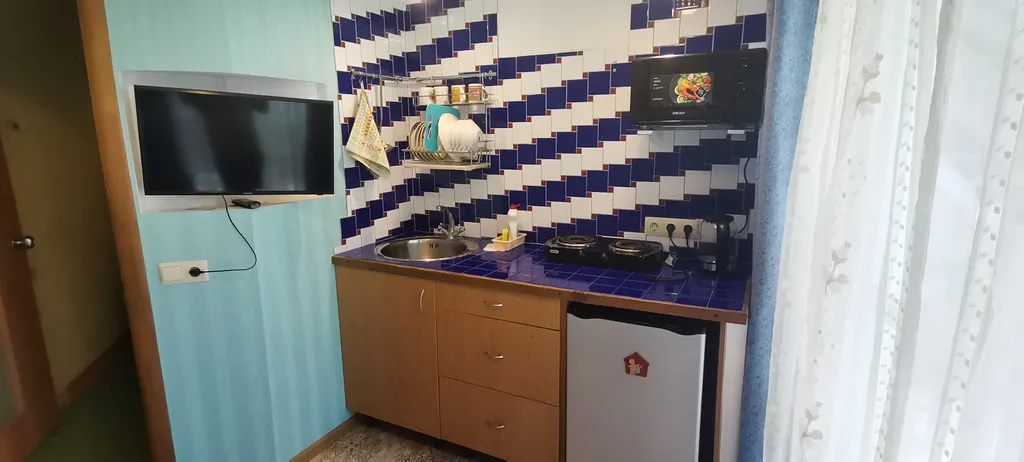 Квартира Уютная квартира в гостевом доме рядом с набережной им. Терешковой — Евпатория