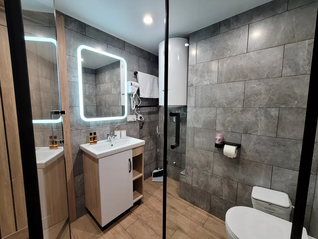 Комфортный двухуровневый апартамент в элитном комплексе Колизей