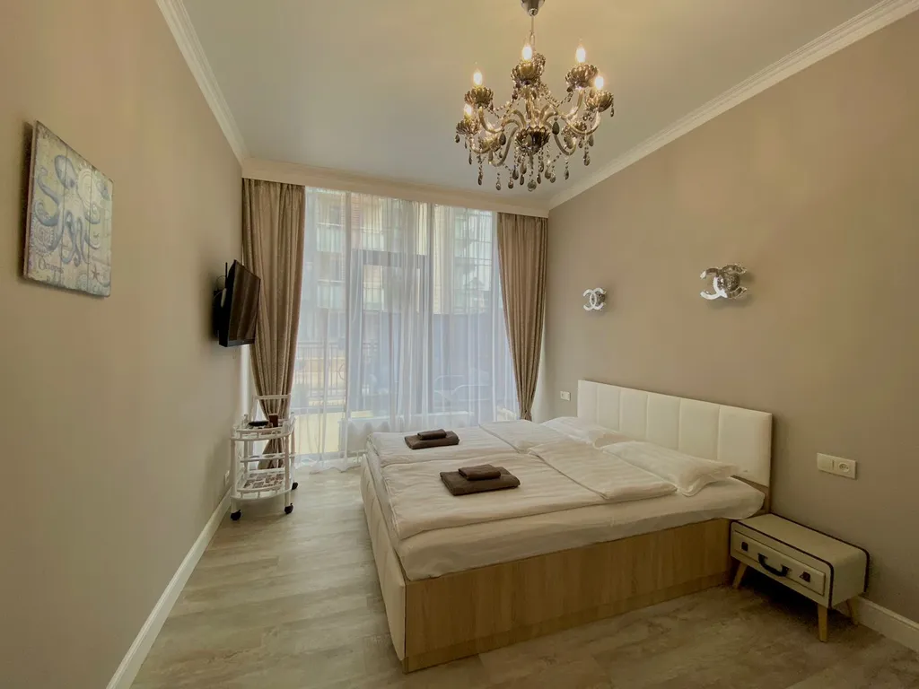 Светлые апарты с собственной террасой у самого моря