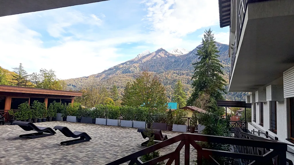 Студия с персональным выходом к шезлонгам - и вы любуетесь горами