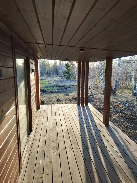 Дом в лесу на берегу озера Увильды