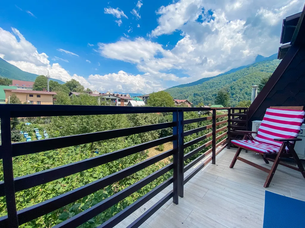 Апартаменты с террасой с панорамным видом на горы