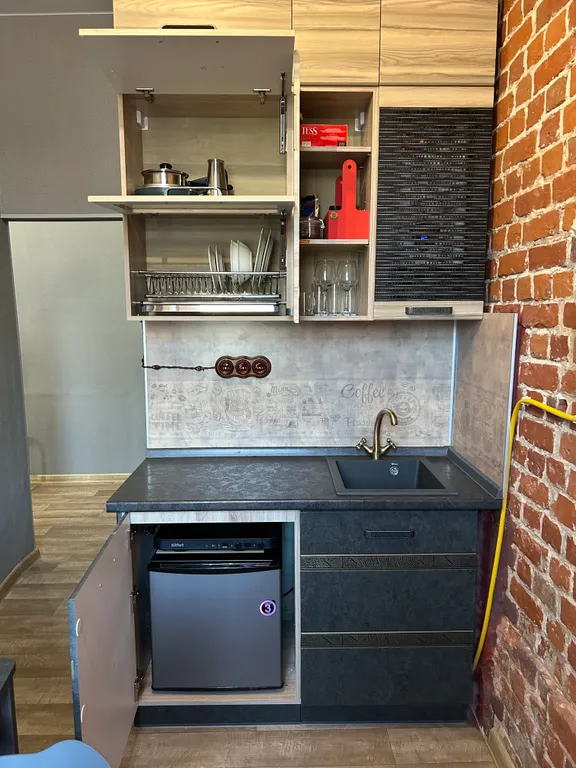 Уютный лофт с историческим балконом на главной улице